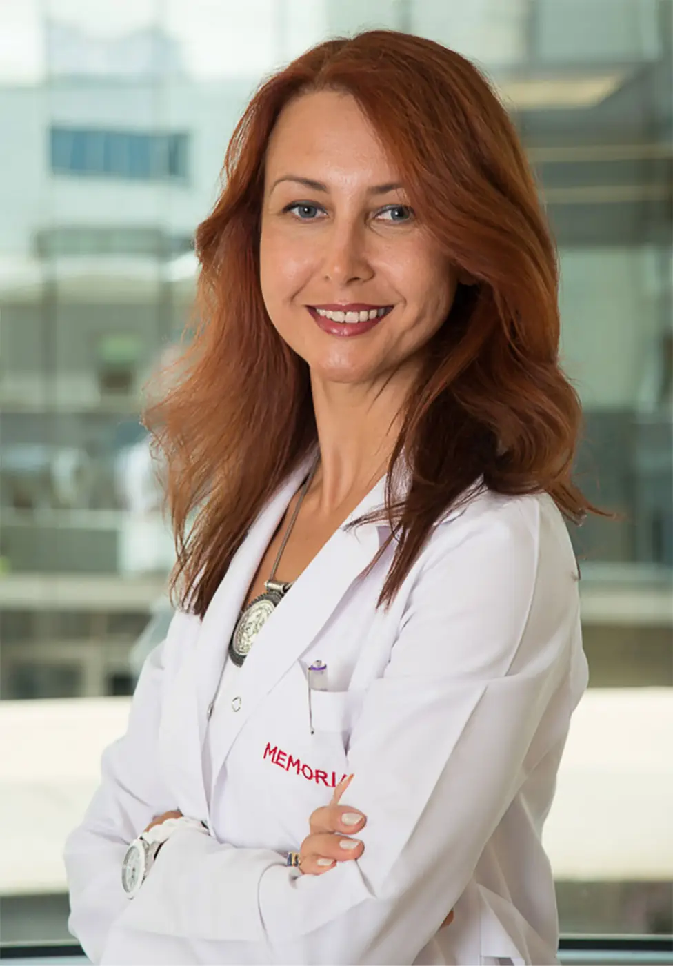 Professional in a white coat photographed in daylight